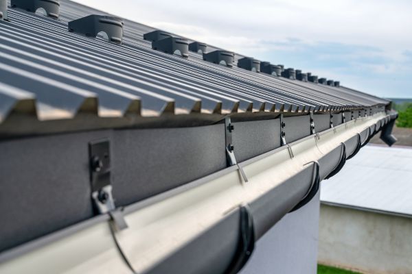 Regular Gutter Cleaning Prevents Expensive Damage